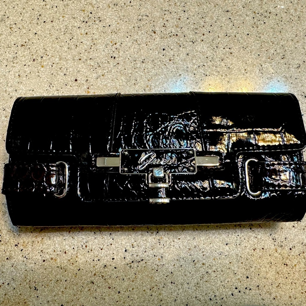 Guess faux croc clutch with detachable strap.